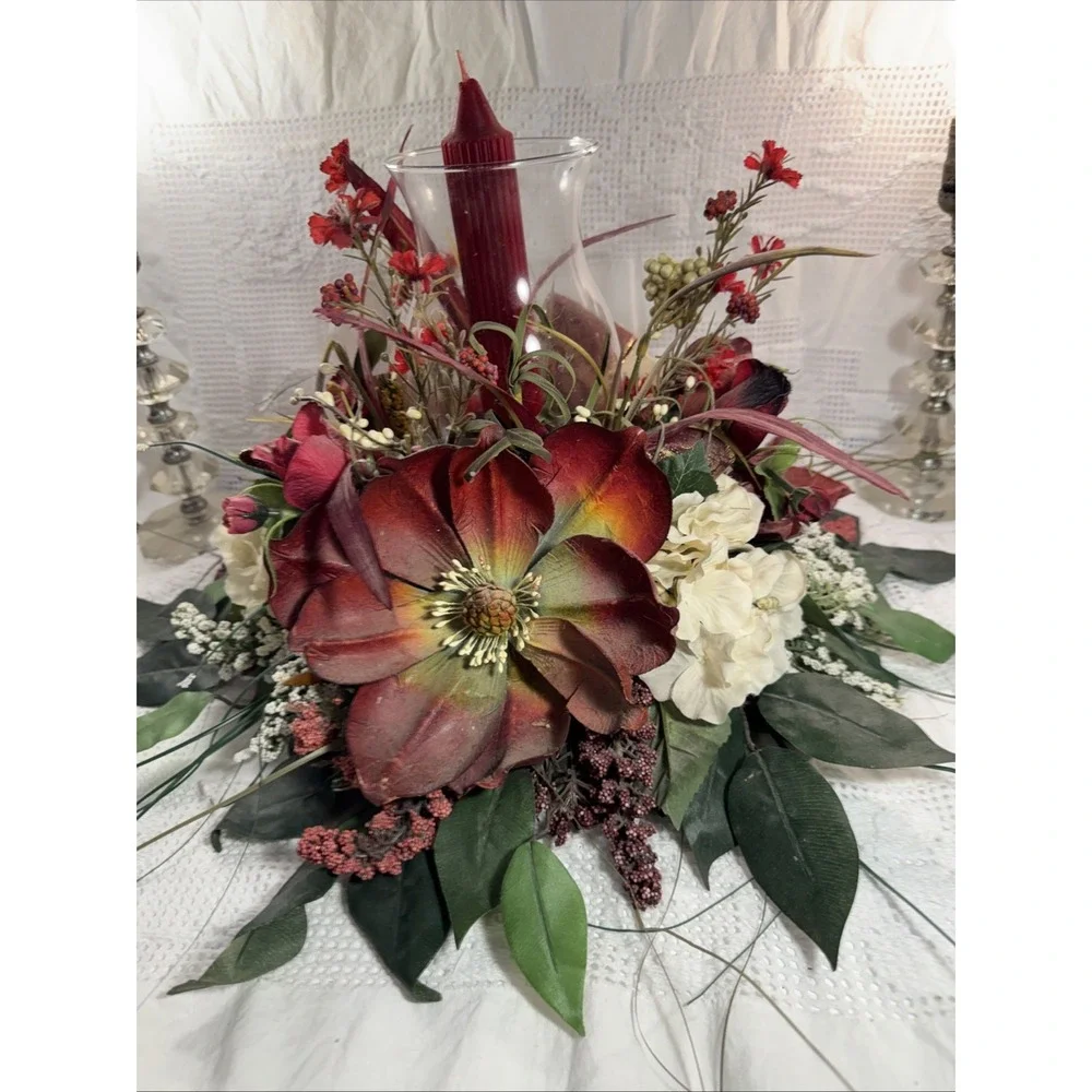 Artificial Fall Themed Floral Centerpiece Surrounding A Glass Vase